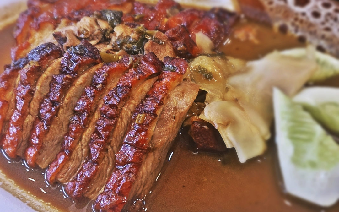 Sliced duck breast with foie gras sauce
